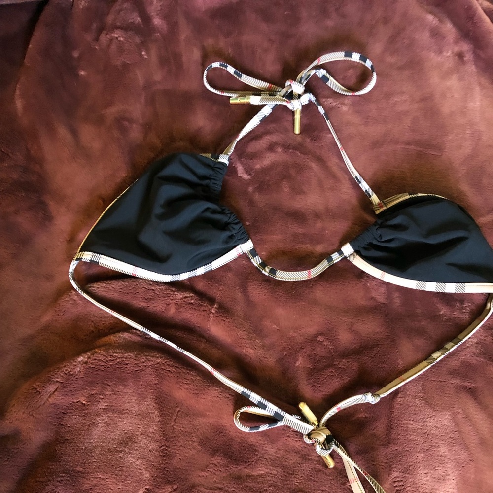 I’m selling a Burberry bikini the colors are black,tan,white,and red